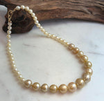 Hand-knotted South Sea and Akoya pearl necklace.