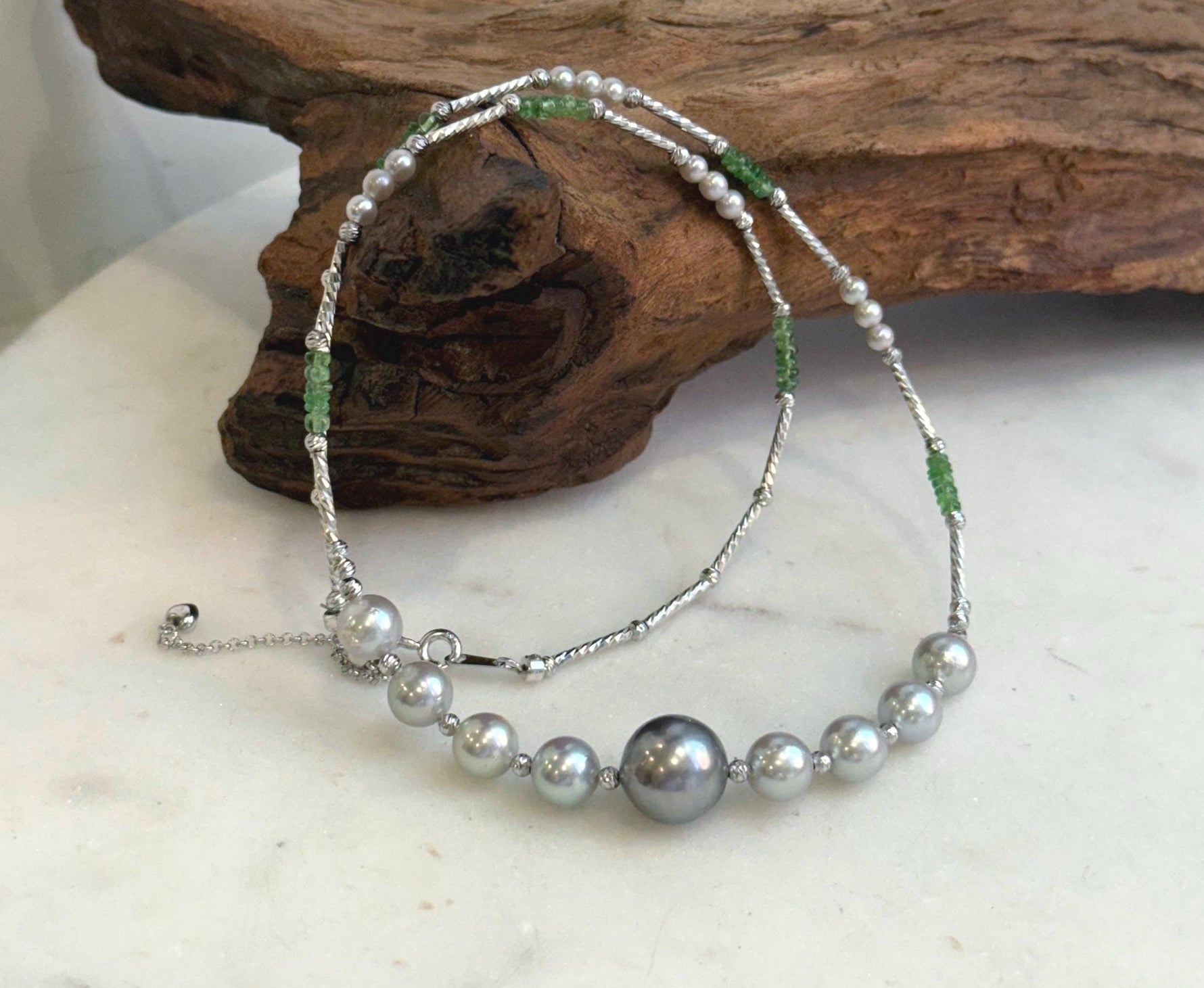 Elly’s Akoya Tahitian ocean pearls Designed Necklace: Extreme luster mirrored, S925 silver Tsavorite necklace, to 19.7”.