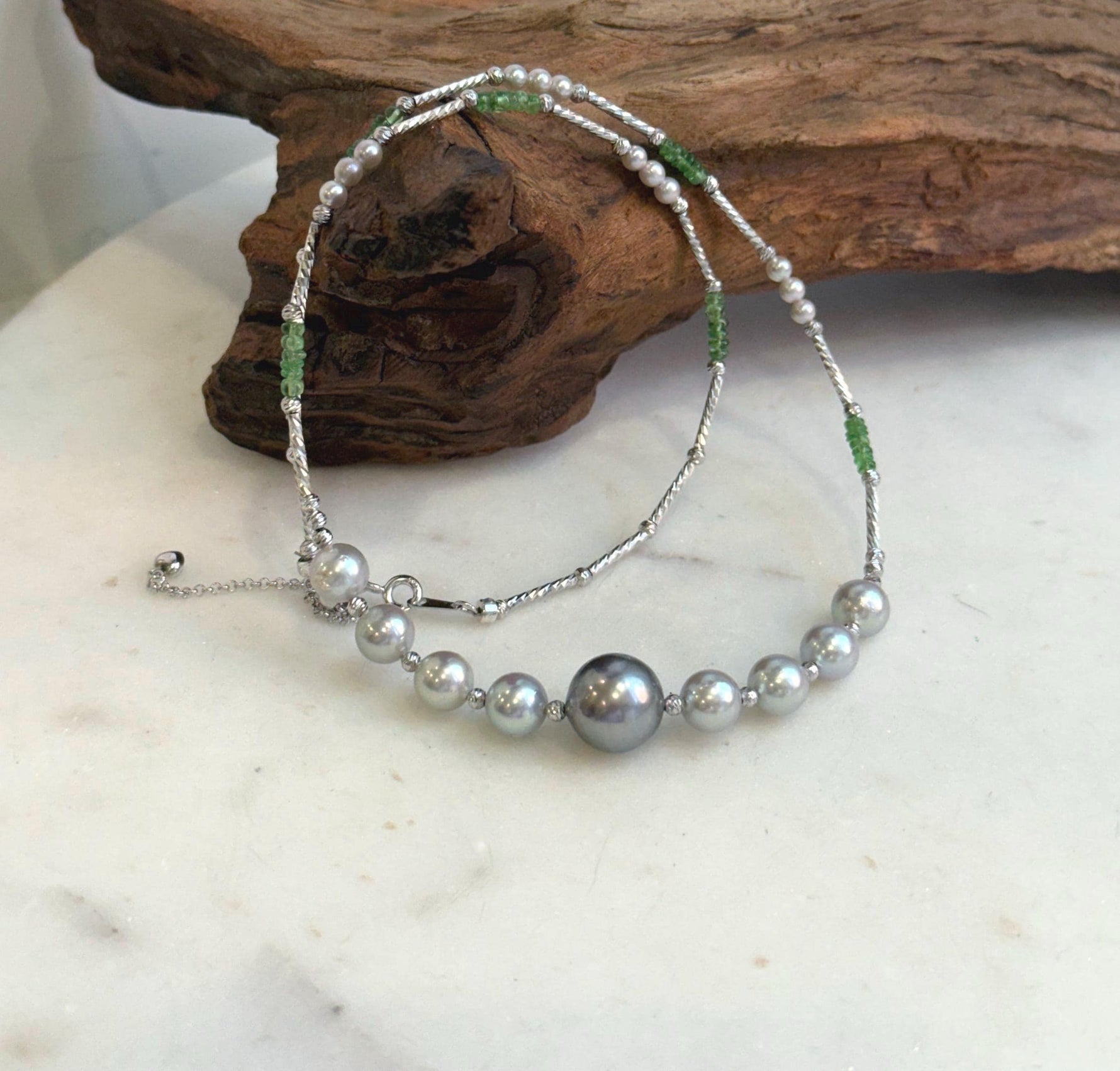 Elly’s Akoya Tahitian ocean pearls Designed Necklace: Extreme luster mirrored, S925 silver Tsavorite necklace, to 19.7”.