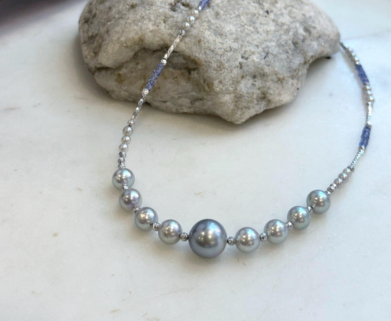 Elly’s Akoya Tahitian ocean pearls Designed Necklace: Extreme luster mirrored, S925 silver Tanzanite Designed necklace, to 18.5”.