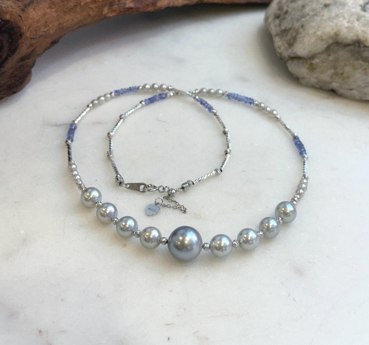 Elly’s Akoya Tahitian ocean pearls Designed Necklace: Extreme luster mirrored, S925 silver Tanzanite Designed necklace, to 18.5”.