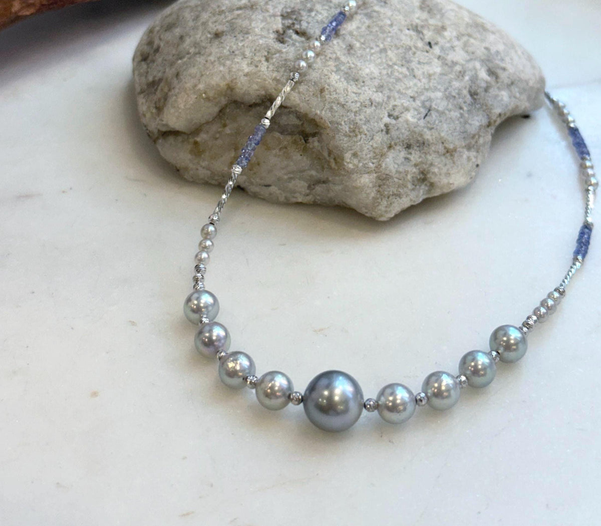 Elly’s Akoya Tahitian ocean pearls Designed Necklace: Extreme luster mirrored, S925 silver Tanzanite Designed necklace, to 18.5”.