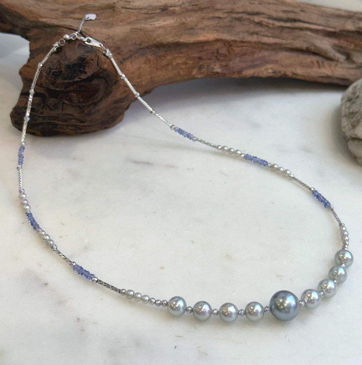 Elly’s Akoya Tahitian ocean pearls Designed Necklace: Extreme luster mirrored, S925 silver Tanzanite Designed necklace, to 18.5”.