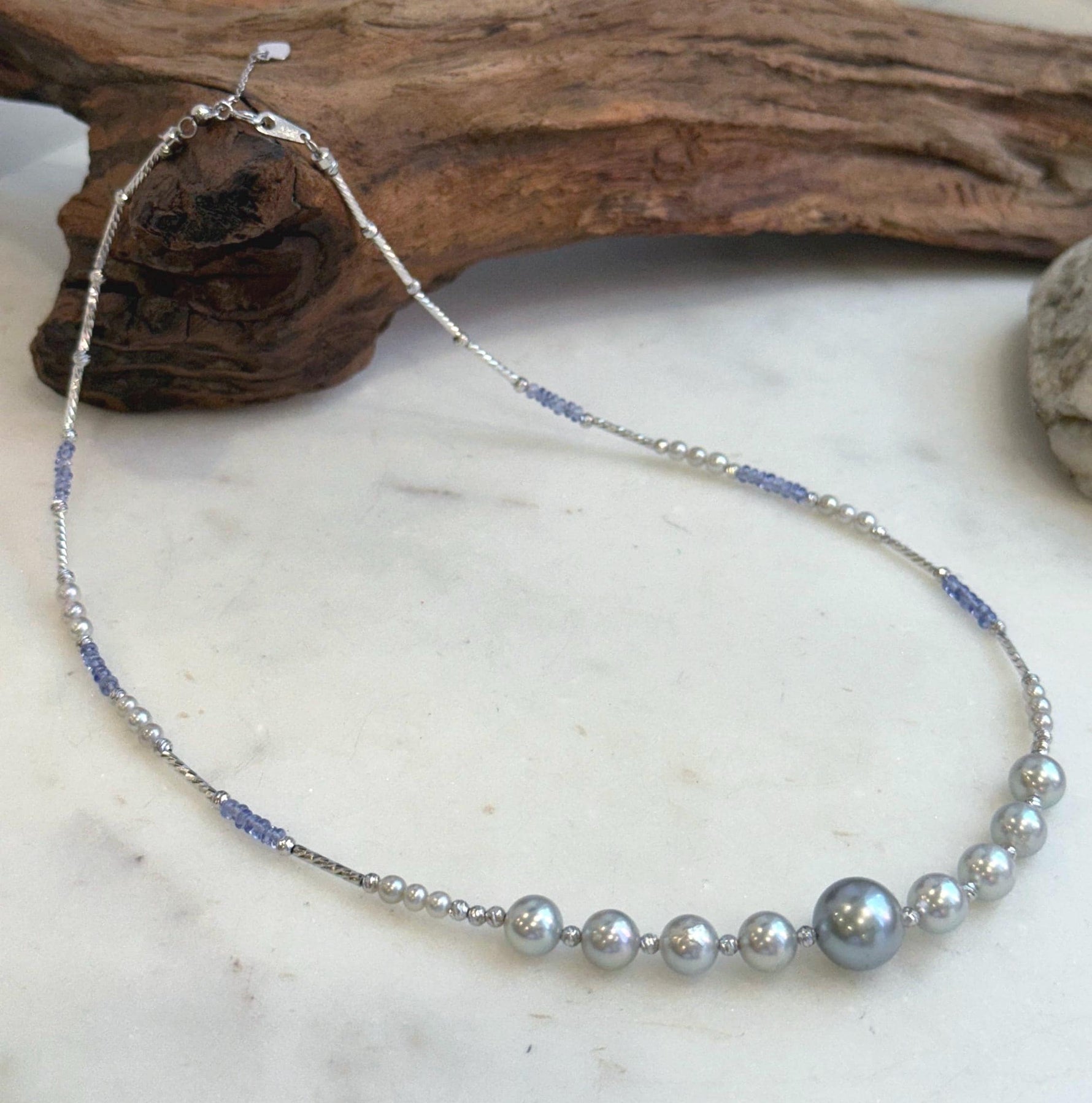 Elly’s Akoya Tahitian ocean pearls Designed Necklace: Extreme luster mirrored, S925 silver Tanzanite Designed necklace, to 18.5”.