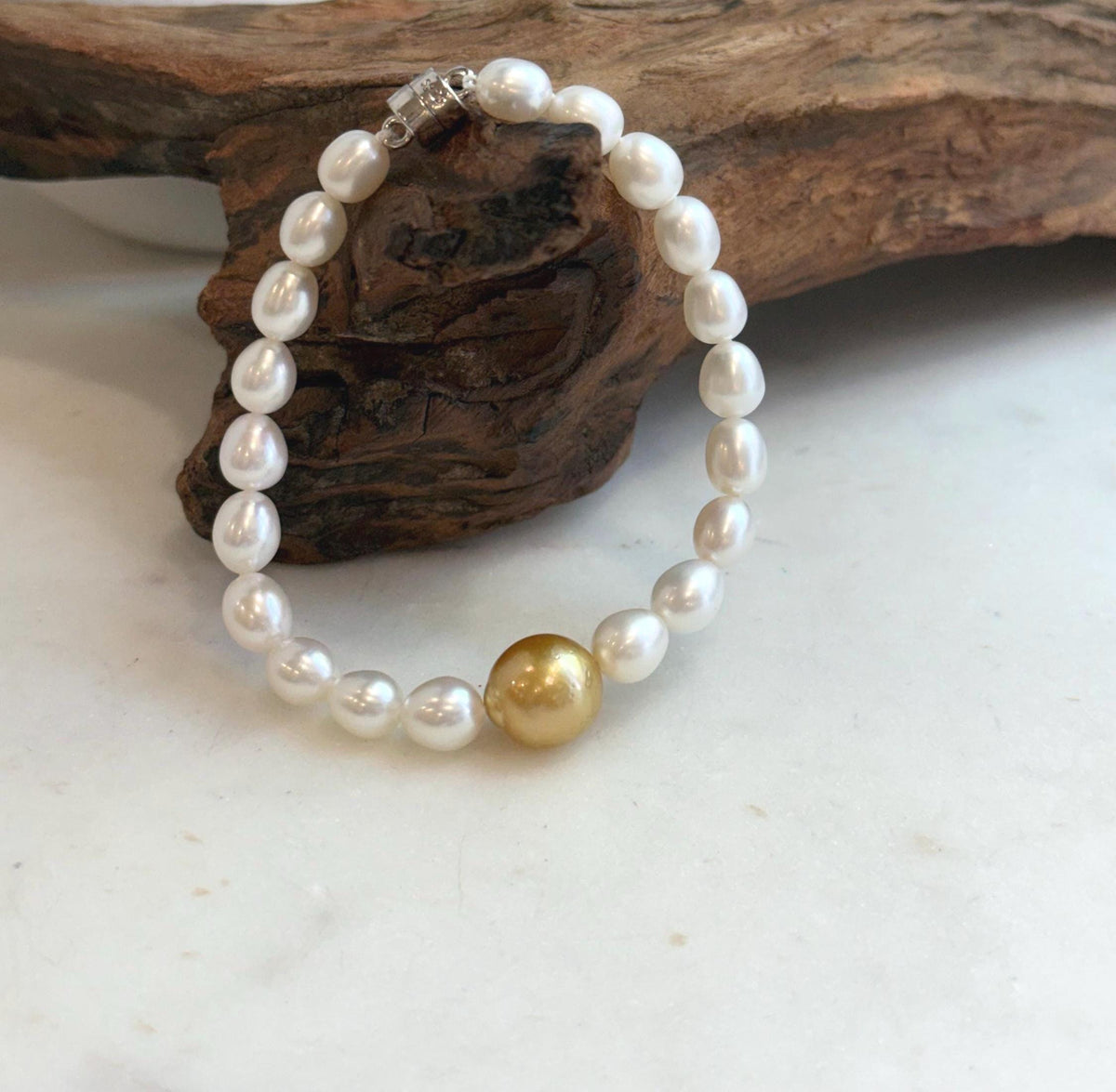 Elly’s 11.2mm South sea deep tea golden Freshwater Pearls Bracelet: Extreme luster mirrored, S925 silver Bracelet. Knotted 7.5”.