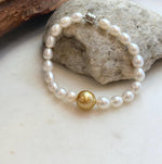 Elly’s 11.2mm South sea deep tea golden Freshwater Pearls Bracelet: Extreme luster mirrored, S925 silver Bracelet. Knotted 7.5”.