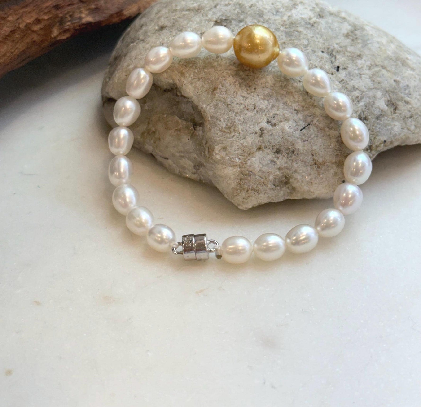 Elly’s 11.2mm South sea deep tea golden Freshwater Pearls Bracelet: Extreme luster mirrored, S925 silver Bracelet. Knotted 7.5”.