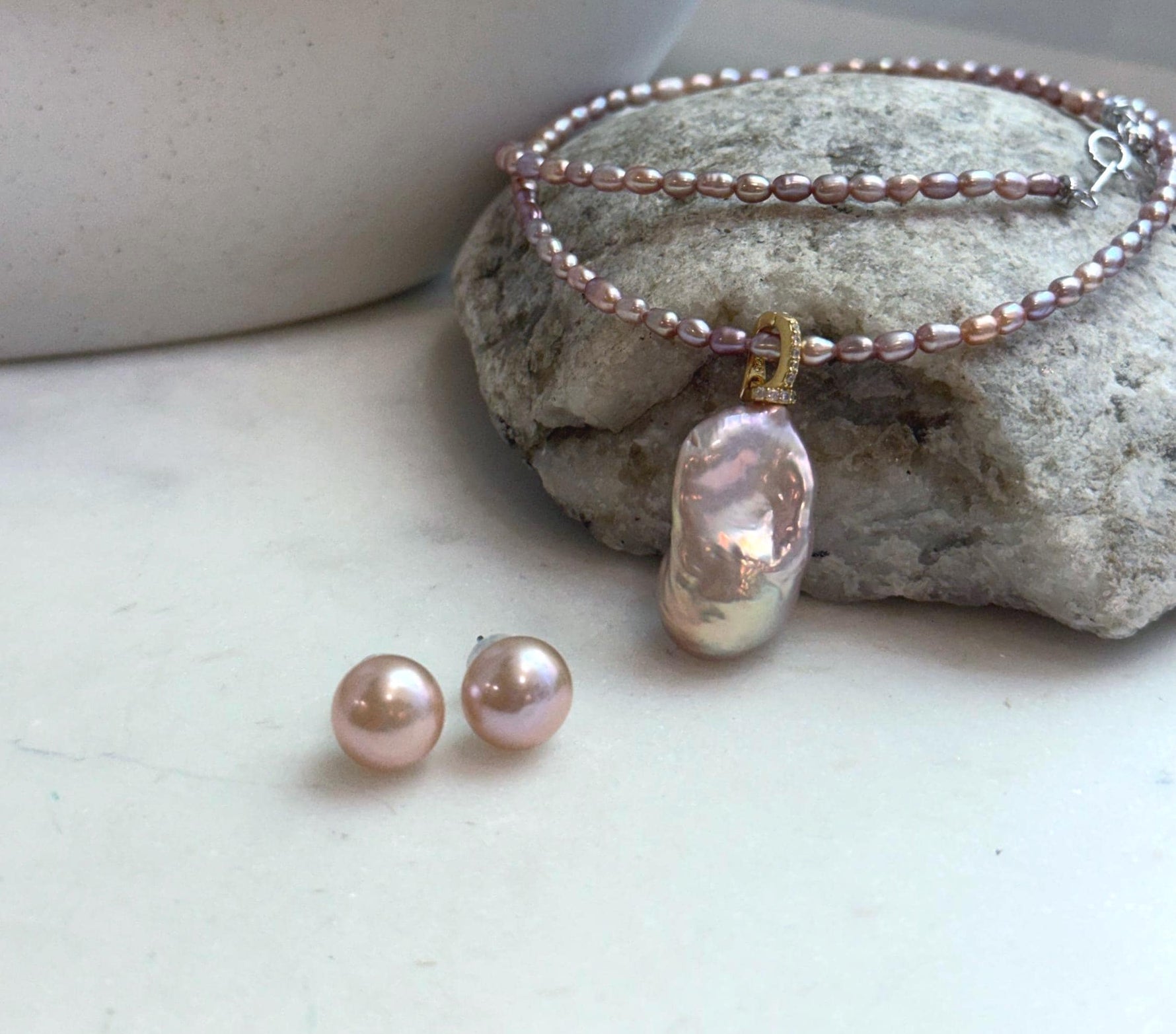 Pink rose freshwater pearl necklace with baroque pearl pendant and matching stud earrings.