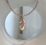 Elegant pink rose pearl pendant necklace with blush pearl stud earrings.