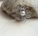 Elly’s 8.9mm Akoya ocean pearl Crab brooch: Extreme luster mirrored, 3.7x3cm, no chain.