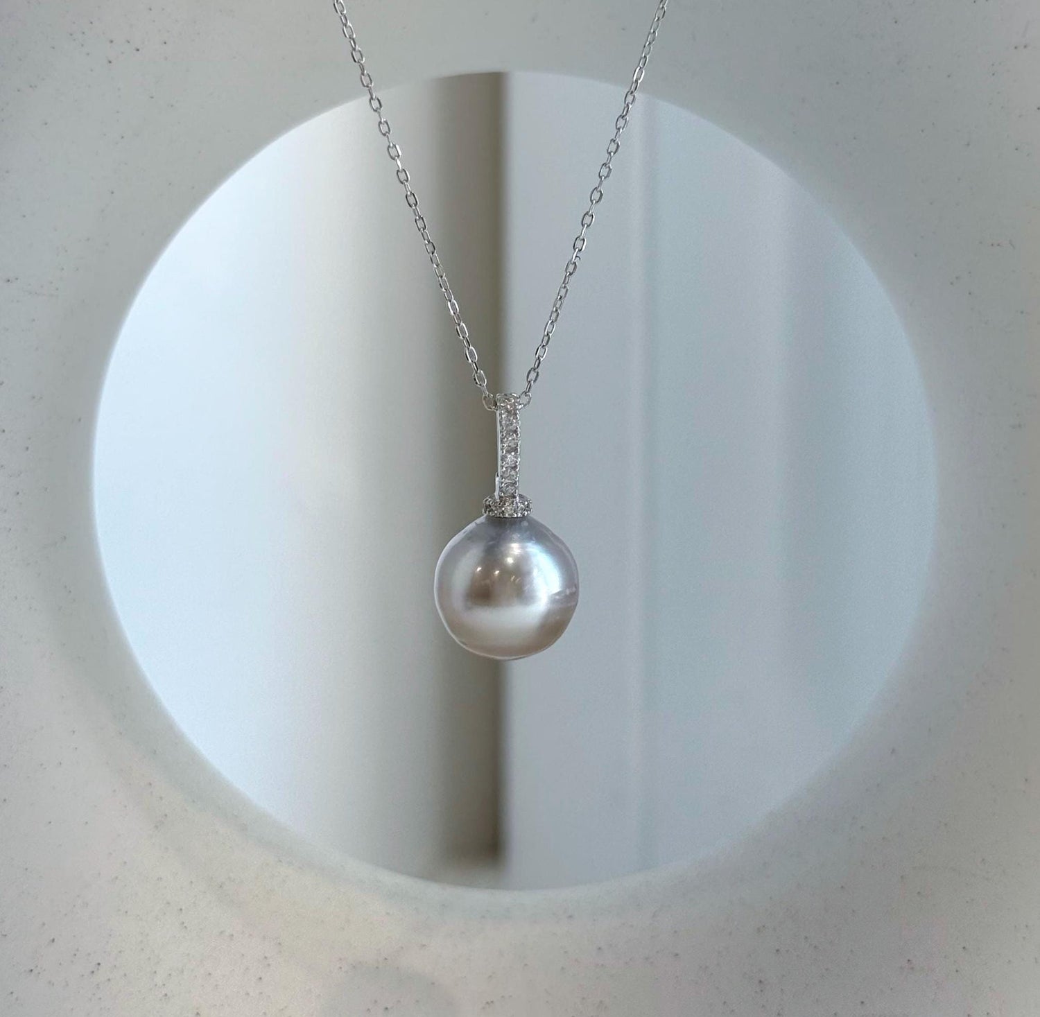 Elly’s 12mm Tahitian Taupe ocean Pearl pendant: Extreme luster mirrored, S925 silver minimalist pendant, 2.2cm high.