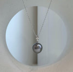 Vintage style Tahitian pearl pendant with high mirror luster in sterling silver.