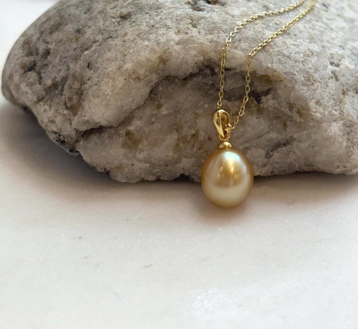 Elly’s 10.2mm South Sea deep tea Gold ocean Pearl pendant: Extreme luster mirrored, 1.9cm high, S925 silver w/ gold plated pendant.