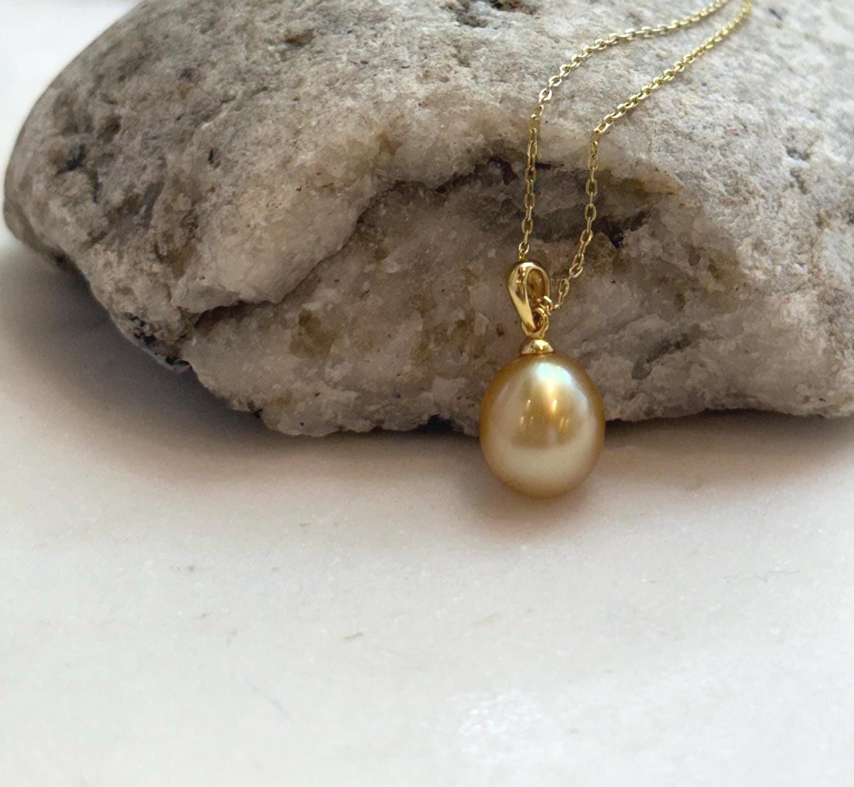 Elly’s 10.2mm South Sea deep tea Gold ocean Pearl pendant: Extreme luster mirrored, 1.9cm high, S925 silver w/ gold plated pendant.