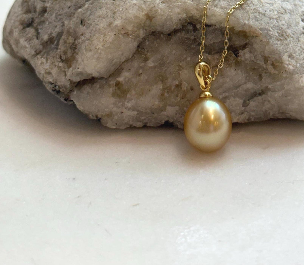 Elly’s 10.2mm South Sea deep tea Gold ocean Pearl pendant: Extreme luster mirrored, 1.9cm high, S925 silver w/ gold plated pendant.