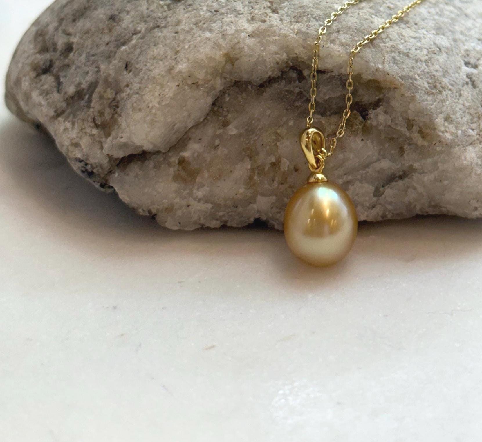 Elly’s 10.2mm South Sea deep tea Gold ocean Pearl pendant: Extreme luster mirrored, 1.9cm high, S925 silver w/ gold plated pendant.