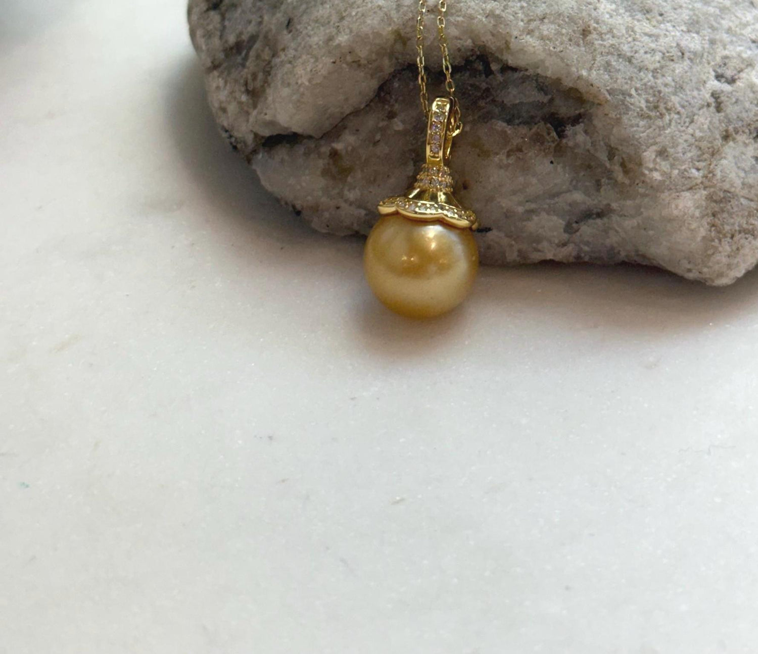 Elly’s 12.6mm South Sea deep Gold ocean Pearl pendant: Extreme luster mirrored, 2.4cm high, S925 silver w/ gold plated pendant.
