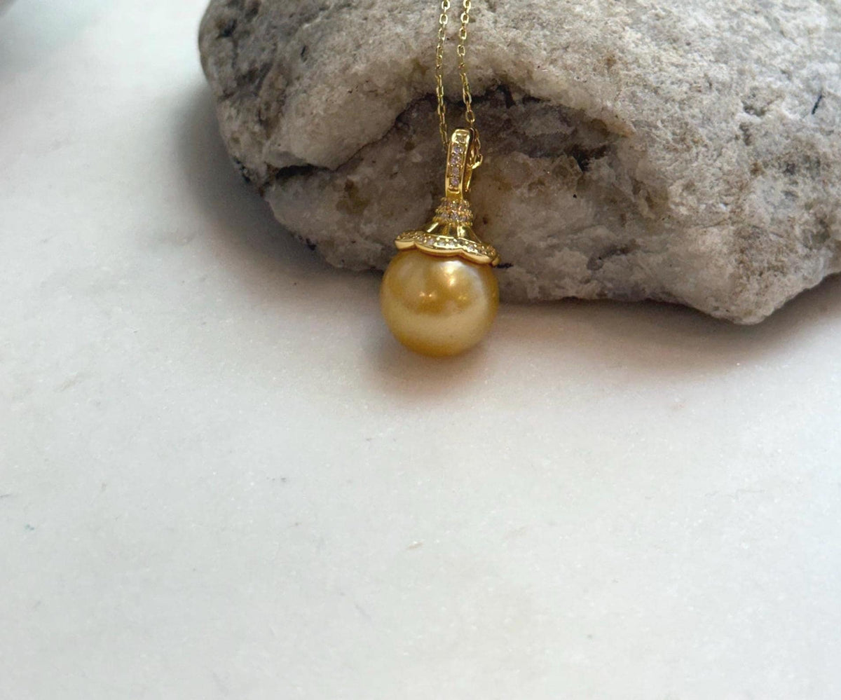 Elly’s 12.6mm South Sea deep Gold ocean Pearl pendant: Extreme luster mirrored, 2.4cm high, S925 silver w/ gold plated pendant.