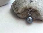 Genuine saltwater Tahitian pearl jewelry featuring exceptional mirror-like luster.