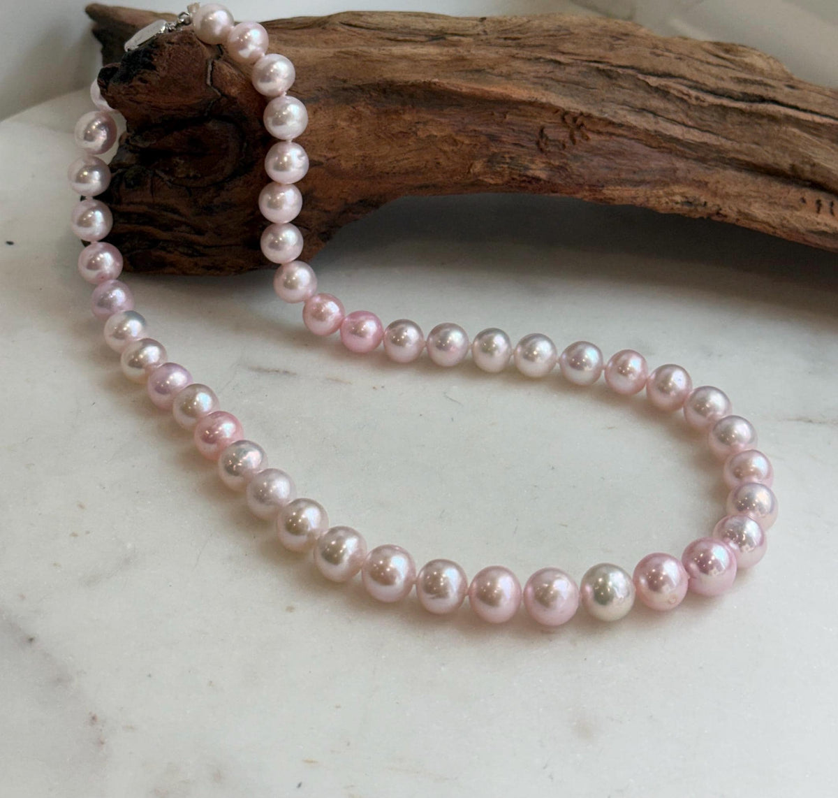 Elly’s 8.5-10.1mm Freshwater Pale Pink pearls necklace: Extreme luster mirrored, 17.5”, s925 silver necklace strand.