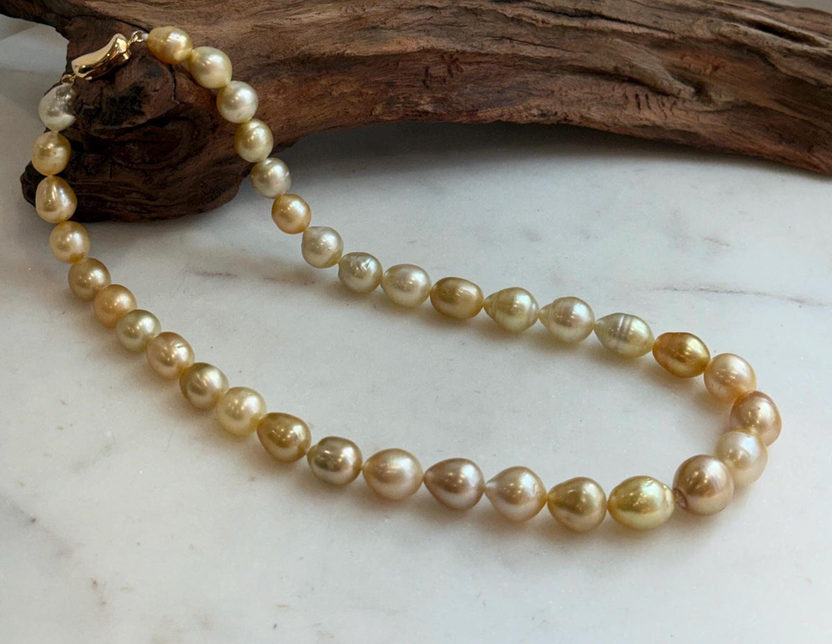 Elly’s 8.4-11.9mm 35pcs Genius natural South sea Golden Ocean Pearls Necklace: Extreme luster, 17.5” knotted, S925 silver necklace strand.