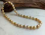 Elly’s 8.4-11.9mm 35pcs Genius natural South sea Golden Ocean Pearls Necklace: Extreme luster, 17.5” knotted, S925 silver necklace strand.