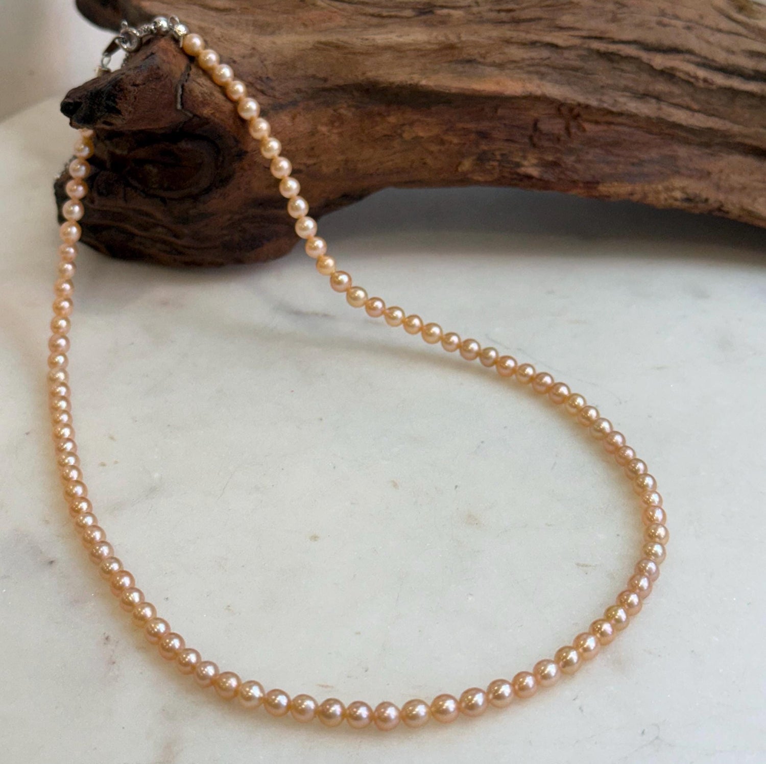 Elly’s 4.1-4.3mm Freshwater Peach gold Pearls Necklace: Extreme luster mirrored, To 18.1”, S925 silver necklace strand.