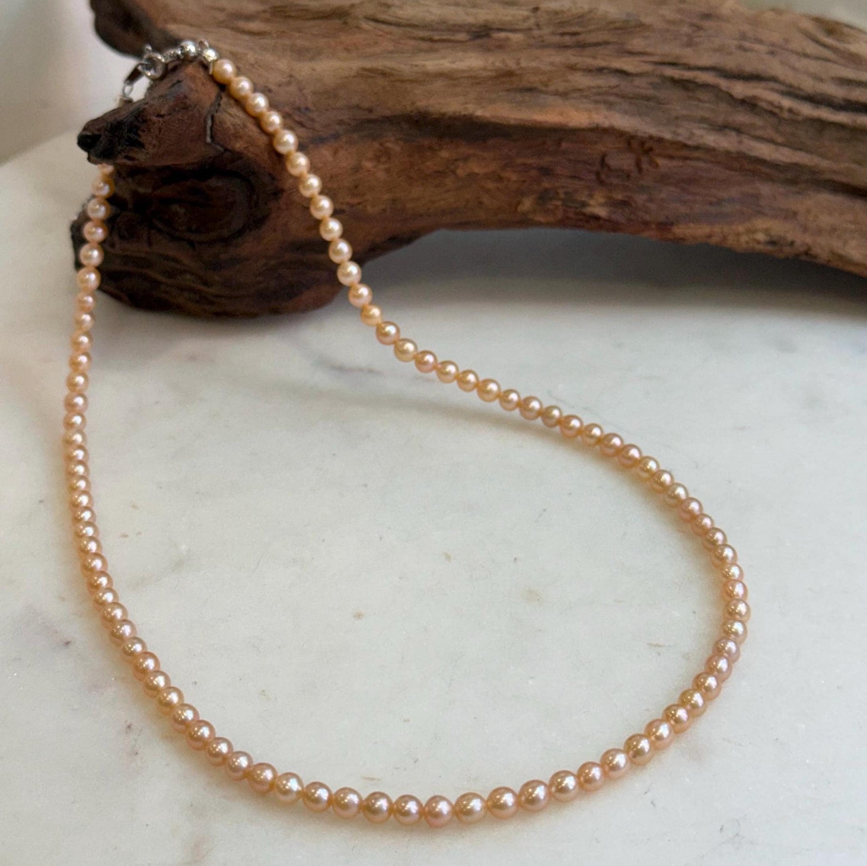 Elly’s 4.1-4.3mm Freshwater Peach gold Pearls Necklace: Extreme luster mirrored, To 18.1”, S925 silver necklace strand.