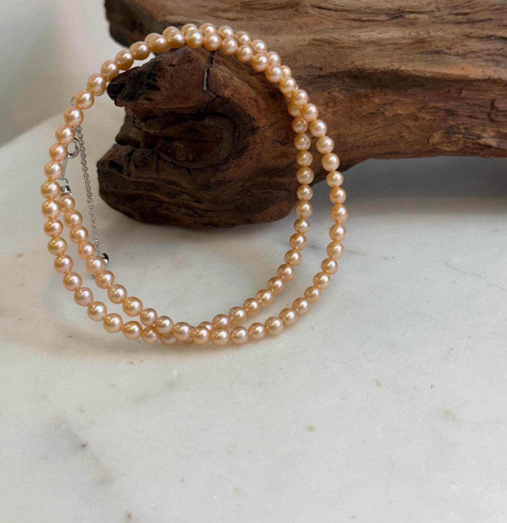 Elly’s 4.1-4.3mm Freshwater Peach gold Pearls Necklace: Extreme luster mirrored, To 18.1”, S925 silver necklace strand.