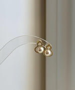 Classic off white pearl stud earrings crafted with hypoallergenic S925 sterling silver.