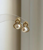 Small freshwater pearl earrings with mirror-like shine, perfect gift for women.