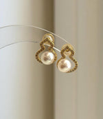 Small freshwater pearl earrings with mirror-like shine, perfect gift for women.