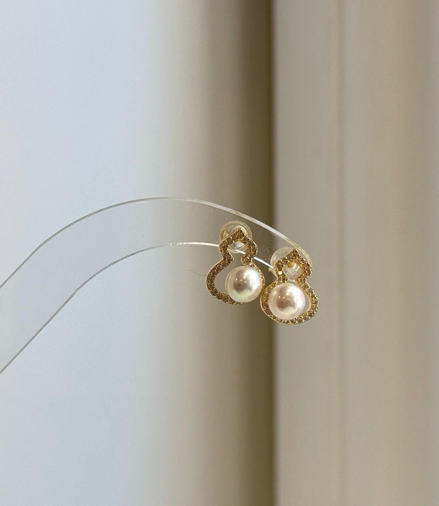 Small freshwater pearl earrings with mirror-like shine, perfect gift for women.
