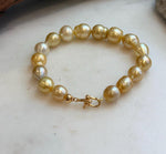 Elly’s 8.9-11.2mm 16pcs Genius South sea golden Ocean Pearls bracelet: Extreme luster, 8.1”, S925 silver bracelet.