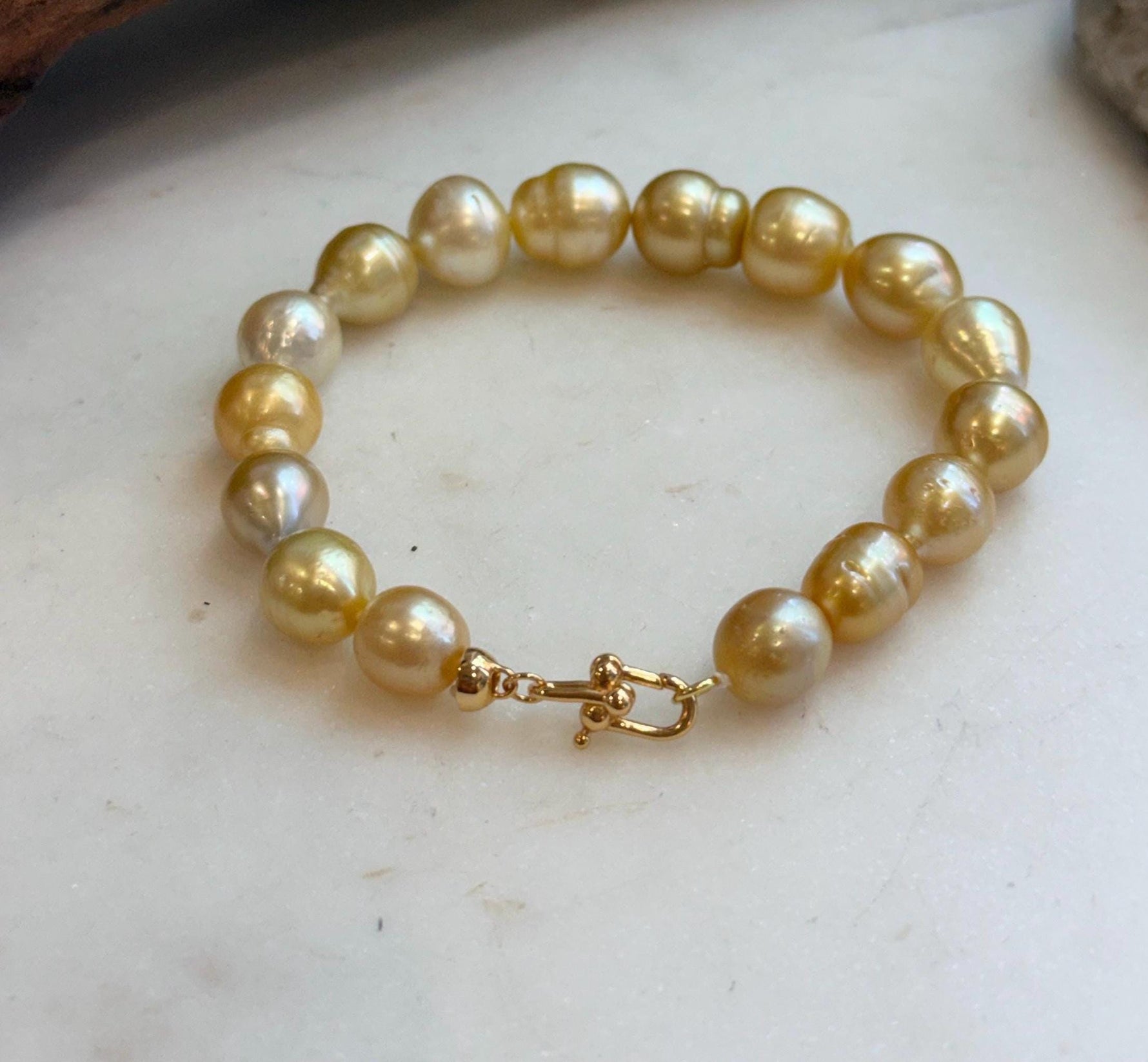 Elly’s 8.9-11.2mm 16pcs Genius South sea golden Ocean Pearls bracelet: Extreme luster, 8.1”, S925 silver bracelet.