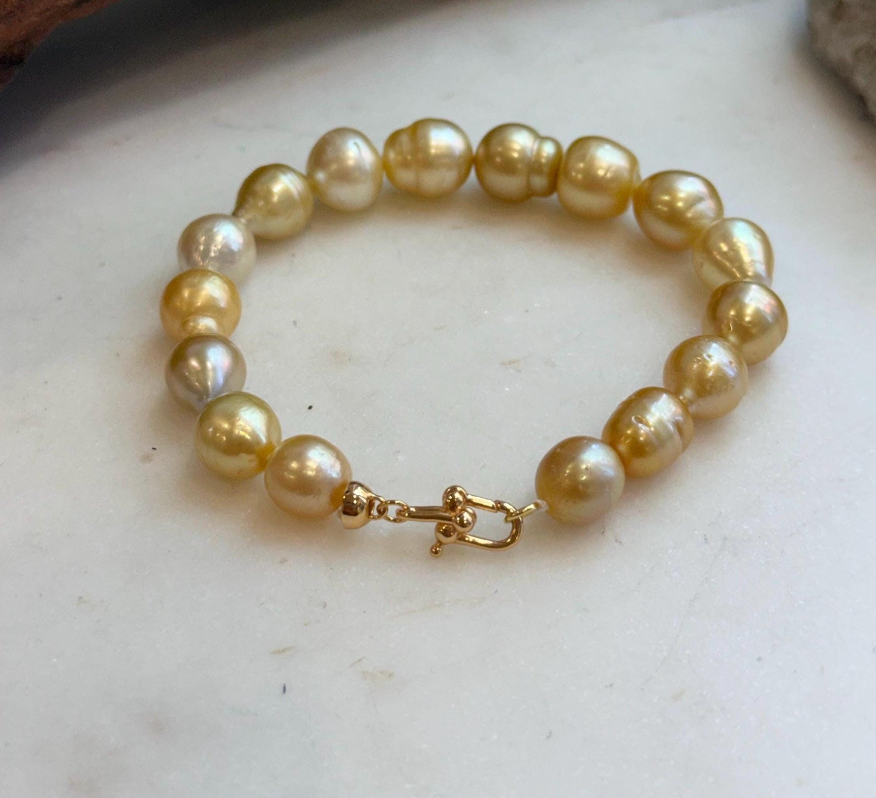 Elly’s 8.9-11.2mm 16pcs Genius South sea golden Ocean Pearls bracelet: Extreme luster, 8.1”, S925 silver bracelet.