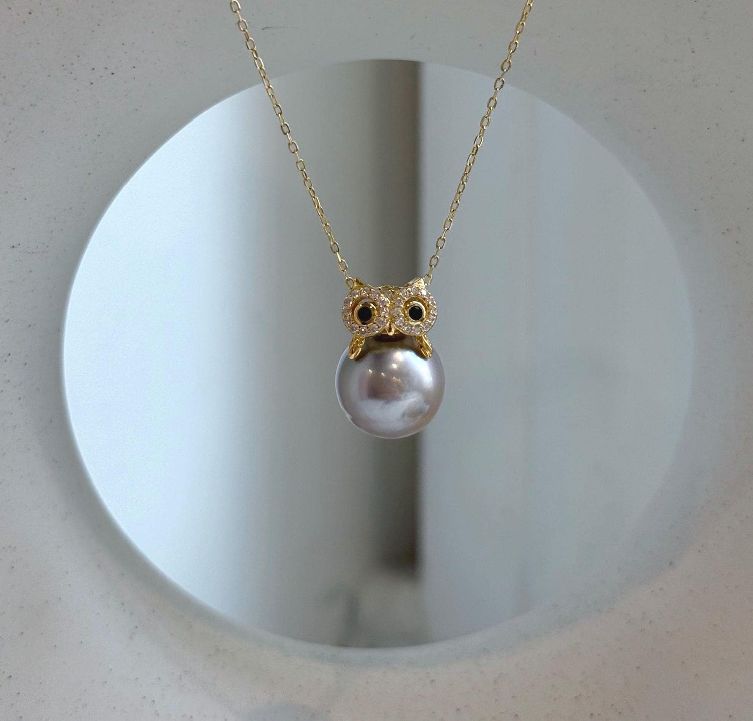 Elly’s 12.1mm Tahitian silver Platinum taupe ocean Owl pendant: Extreme luster mirrored, S925 silver pendant.