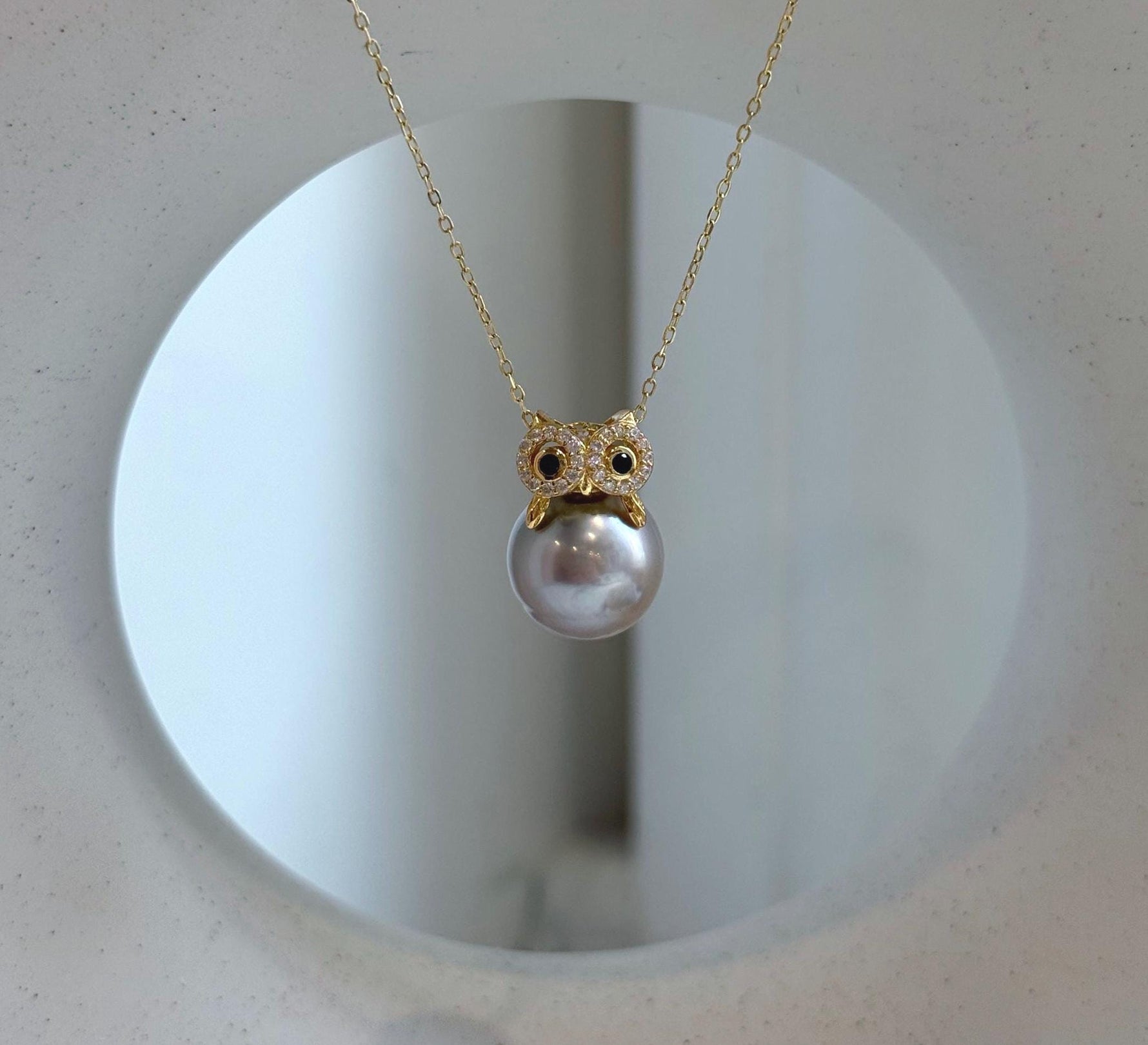 Elly’s 12.1mm Tahitian silver Platinum taupe ocean Owl pendant: Extreme luster mirrored, S925 silver pendant.