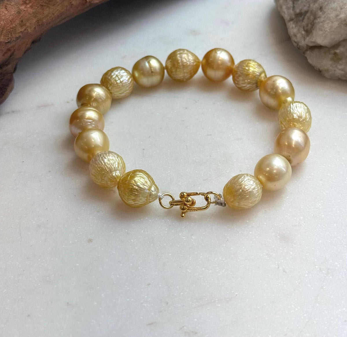 Elly’s 10.3-12.3mm 15pcs Genius South sea golden Ocean Pearls bracelet: Extreme luster, 8.3”, S925 silver bracelet.
