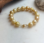 Elly’s 10.3-12.3mm 15pcs Genius South sea golden Ocean Pearls bracelet: Extreme luster, 8.3”, S925 silver bracelet.