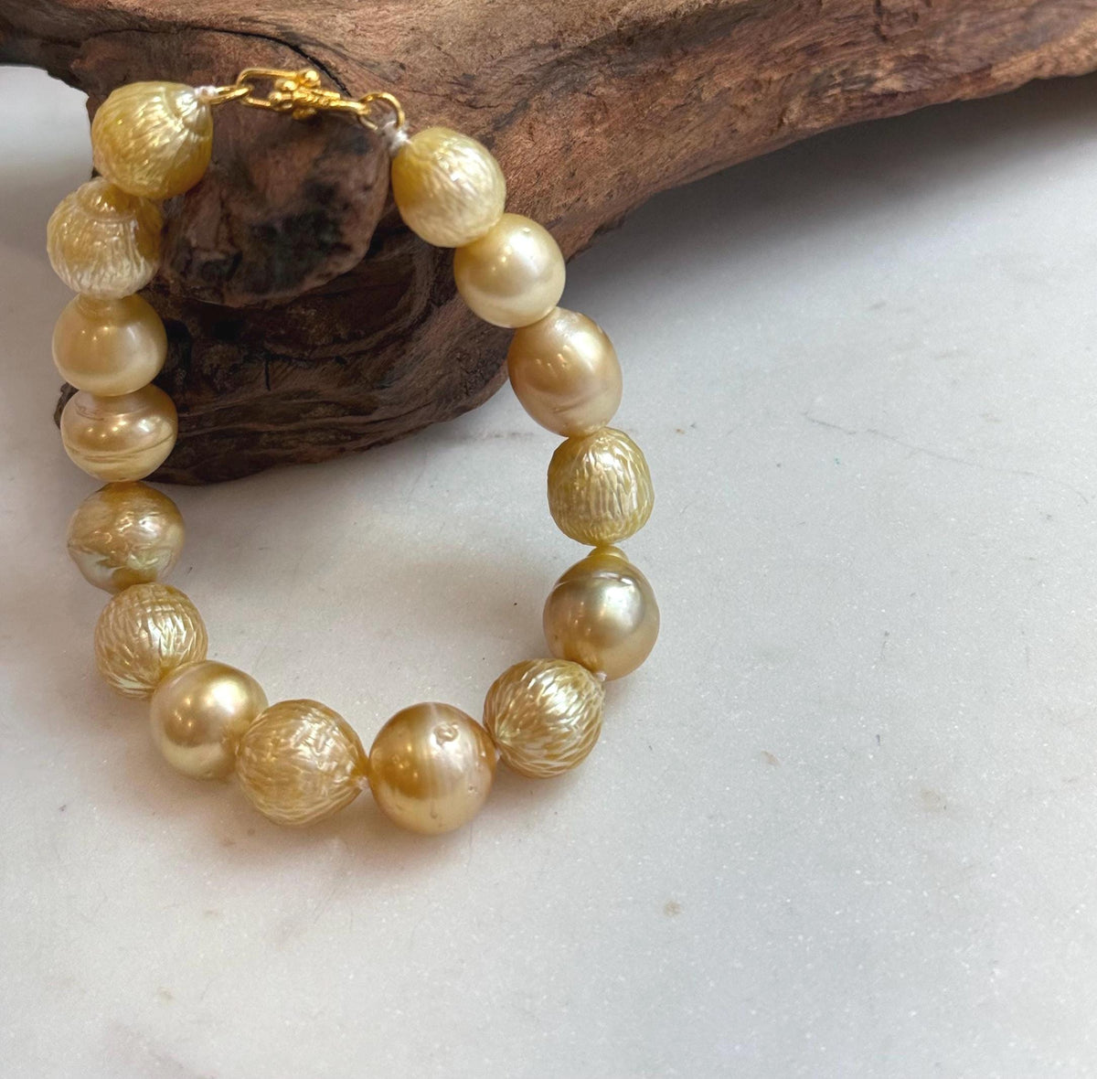 Elly’s 10.3-12.3mm 15pcs Genius South sea golden Ocean Pearls bracelet: Extreme luster, 8.3”, S925 silver bracelet.