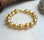 Elly’s 10.3-12.3mm 15pcs Genius South sea golden Ocean Pearls bracelet: Extreme luster, 8.3”, S925 silver bracelet.