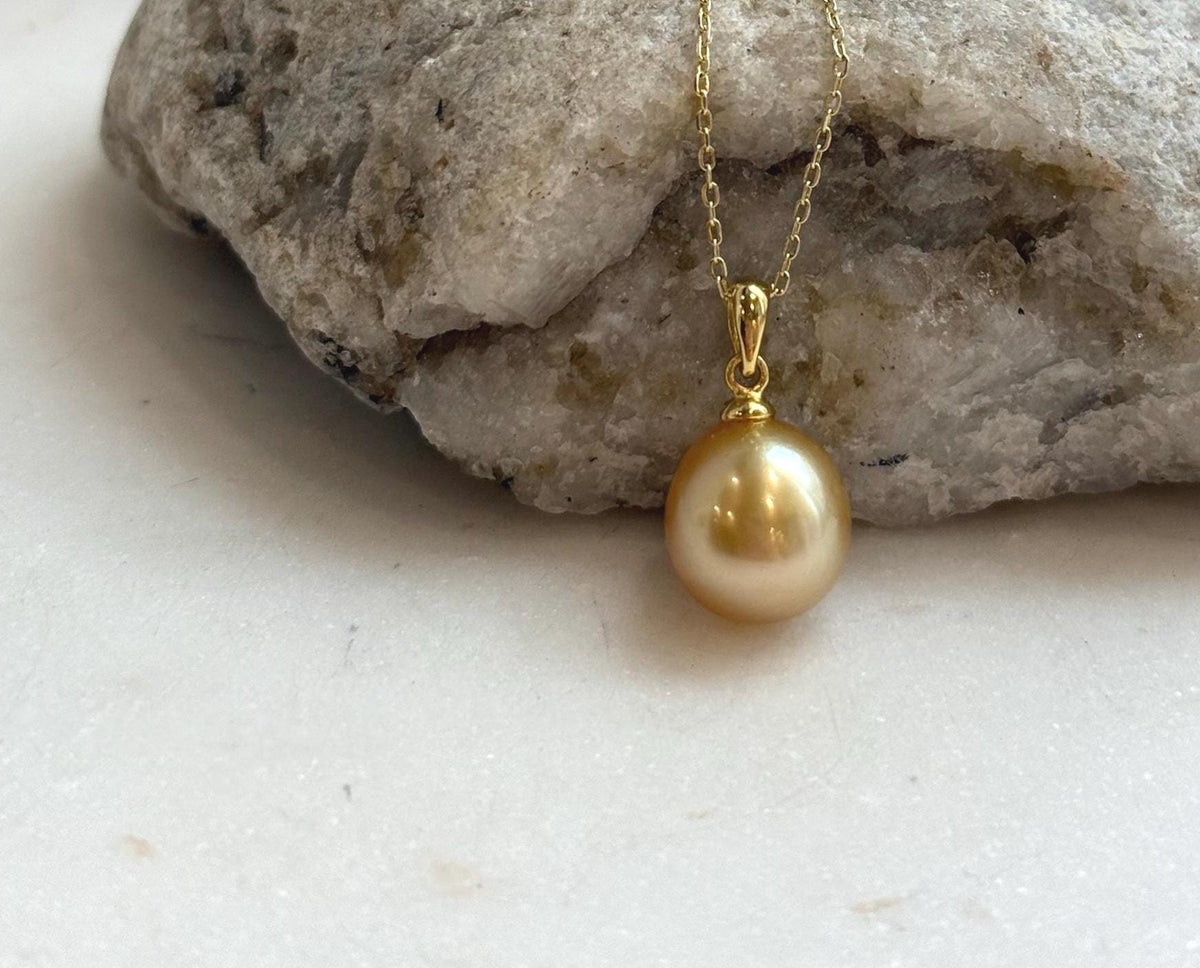 Elly’s 10.6mm South Sea deep tea Gold ocean Pearl pendant: Extreme luster mirrored, 1.9cm high, S925 silver w/ gold plated pendant.