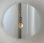 Luxury South Sea pearl pendant with exceptional mirror luster and sterling silver setting.
