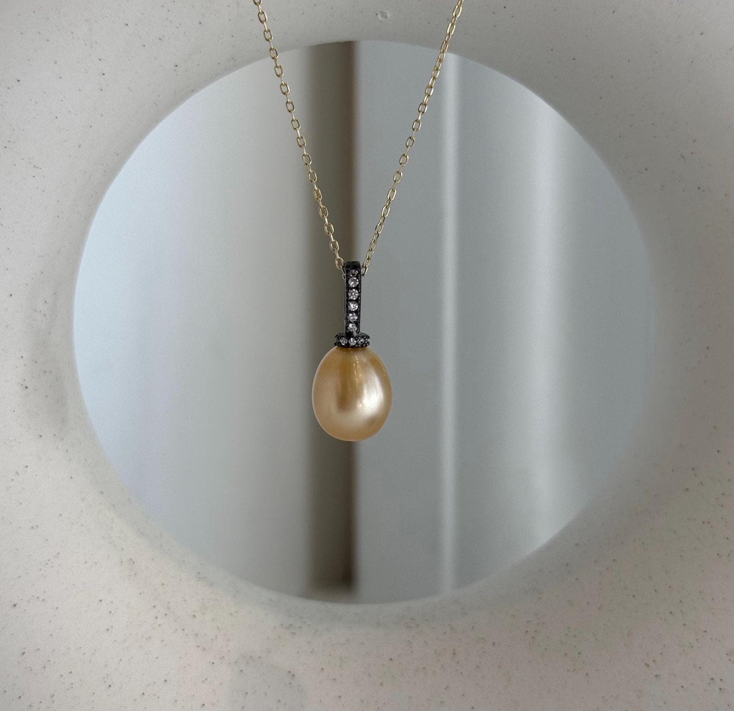 1. 7mm genuine South Sea deep tea gold pearl pendant with mirror luster in S925 sterling silver.