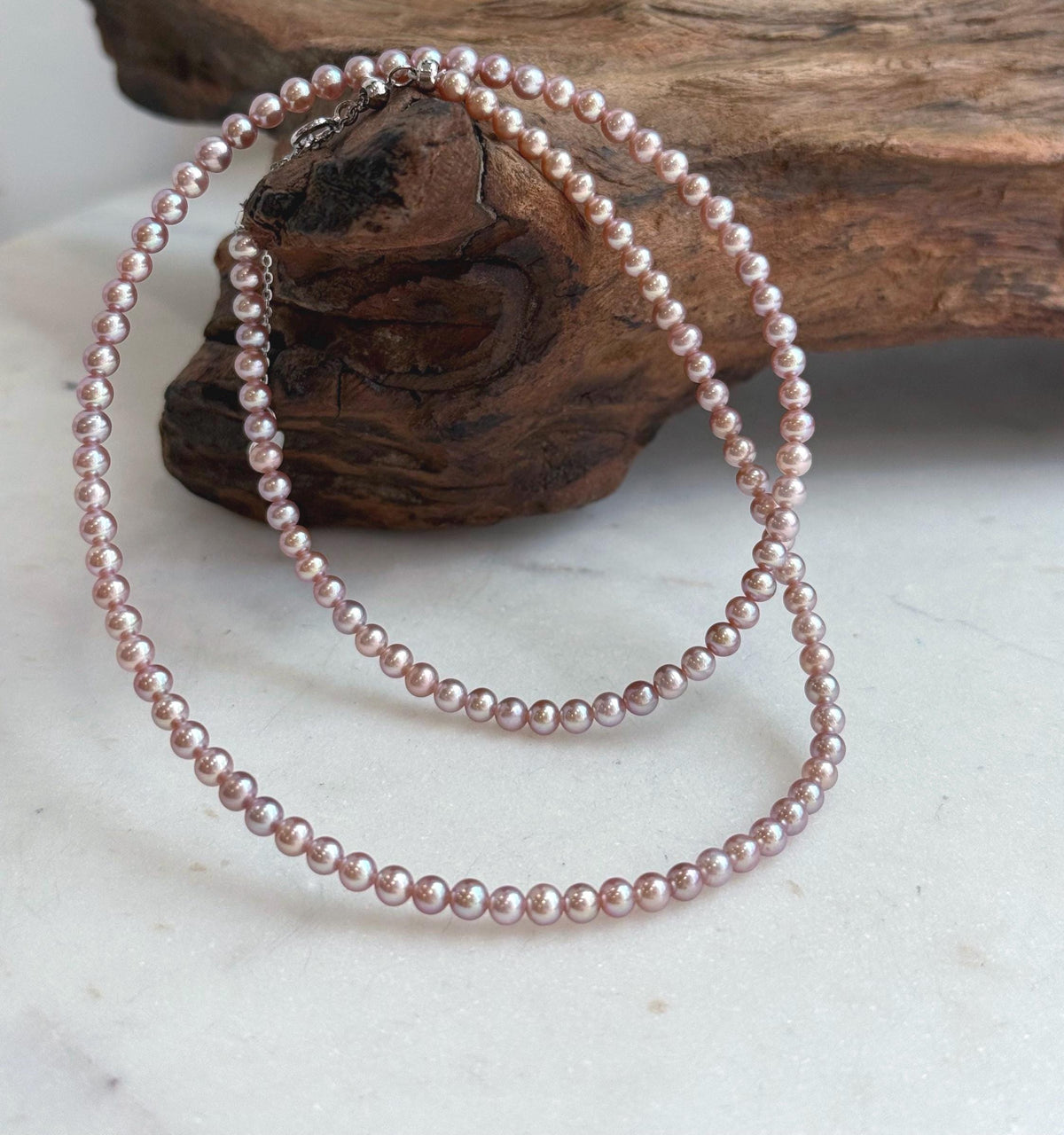 Elly’s Top quality 3.3-3.7mm Freshwater Metallic rose Pearls Necklace: Extreme luster mirrored, To 18.5”, S925 silver necklace strand.