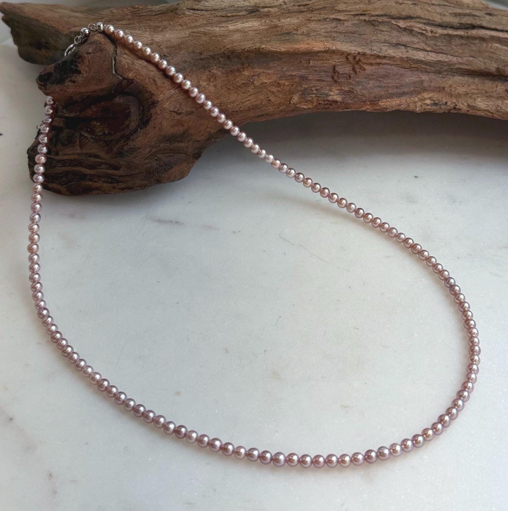 Elly’s Top quality 3.3-3.7mm Freshwater Metallic rose Pearls Necklace: Extreme luster mirrored, To 18.5”, S925 silver necklace strand.