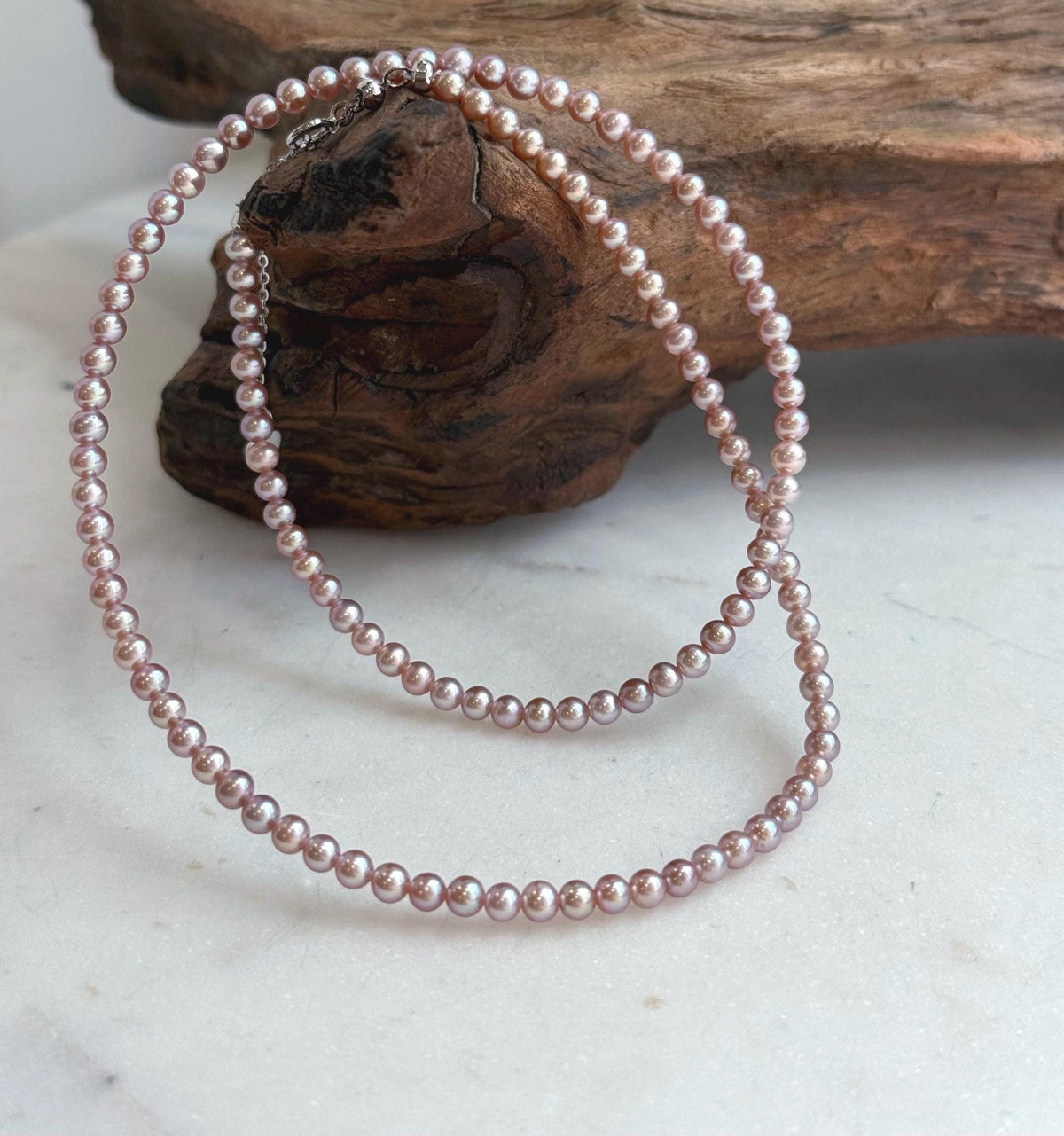 Elly’s Top quality 3.3-3.7mm Freshwater Metallic rose Pearls Necklace: Extreme luster mirrored, To 18.5”, S925 silver necklace strand.