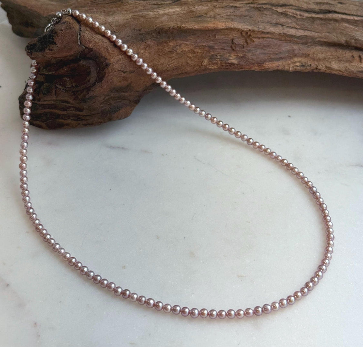 Elly’s Top quality 3.3-3.7mm Freshwater Metallic rose Pearls Necklace: Extreme luster mirrored, To 18.5”, S925 silver necklace strand.