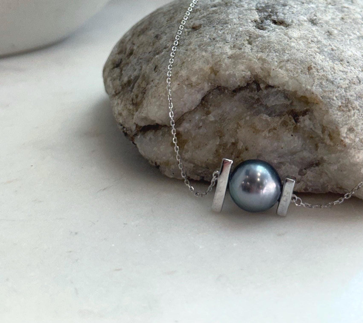 Genuine South Sea golden pearl paired with Tahitian pearl on an S925 sterling silver pendant.